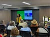 Congresswoman Analilia Mejia (NJ-11) informs a room full of seniors at the Village
Apartments, a JCHC building, about the many resources her office provides.