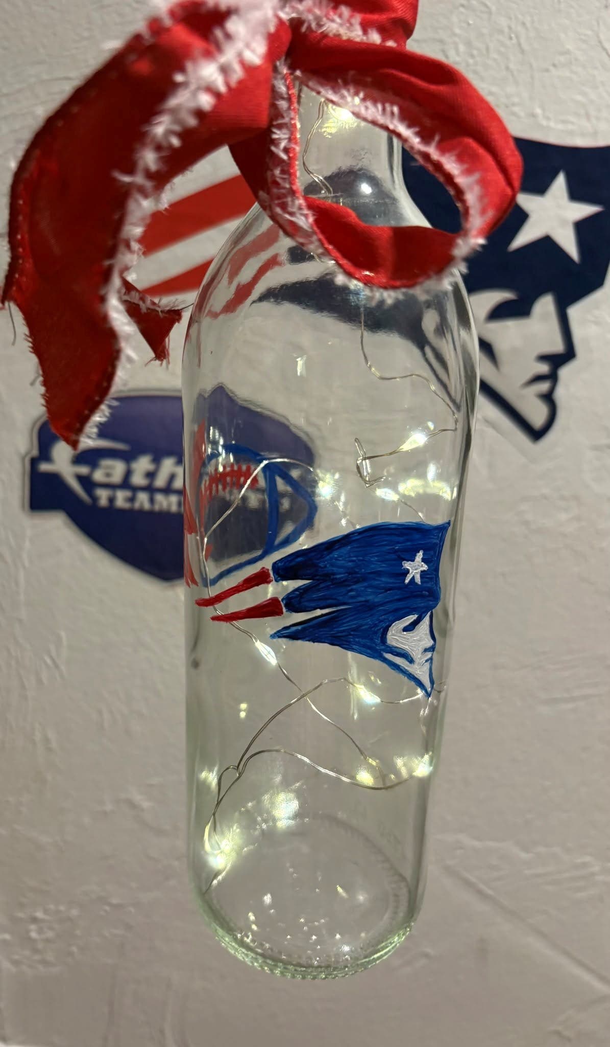 Patriots wine bottle paint night at CraftRoots Brewery