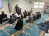 Members of the Ahmadiyya Muslim Community gather in prayer during Eid at Baitul Ata Mosque in the Lehigh Valley.