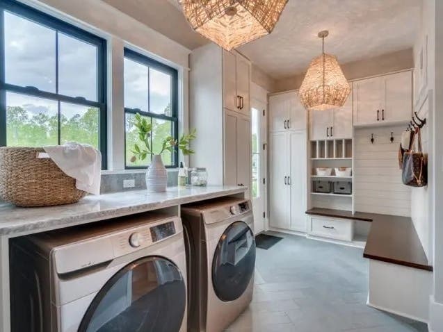 Laundry room with bench