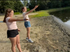 Talia Forman (left) and Robin Meltzer (right), students in the Temple Isaiah Hebrew School program, participating in the Tashlich service. Both students will celebrate their B'nai Mitzvah this coming November.