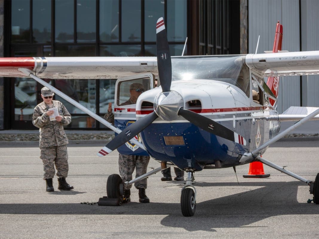 Erik Epstein, a Civil Air Patrol cadet, learns how to conduct a preflight inspection of a Cessna 182 before an orientation flight.