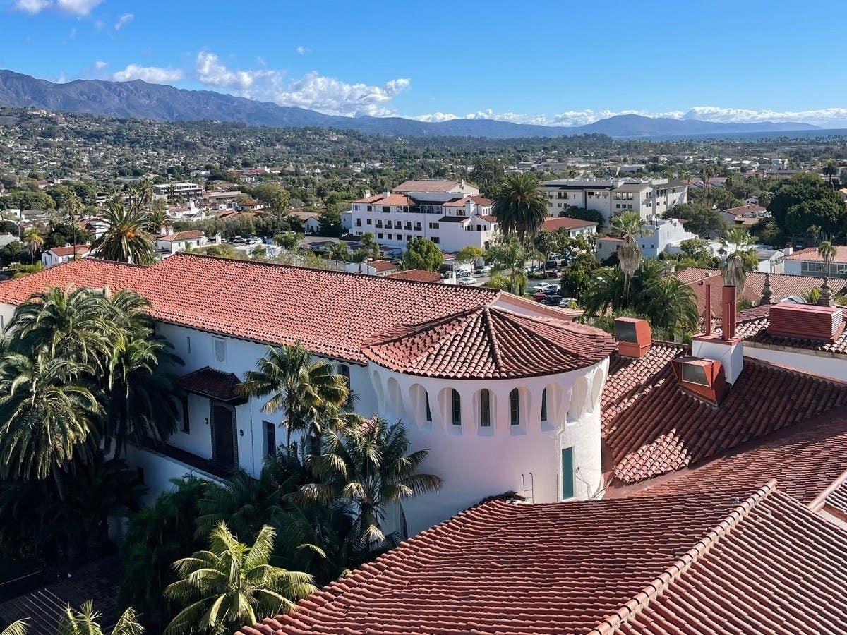 Red tile rooftops in downtown Santa Barbara. Under Medi-Cal rules the house you live in is not counted, but the savings behind it are.