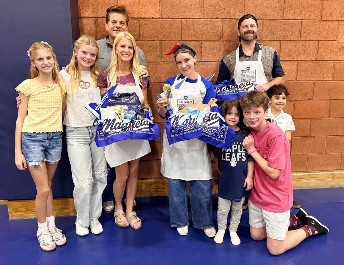 From left, Katie, Coco, Billy and April Costigan celebrate April's Fan Favorite award with second-place winner Maral Kirkpatrick, Georgina Kirkpatrick and Tommy Costigan. In the back row, at right, are first-place winner Matthew Wilson and Dashiell Wilson