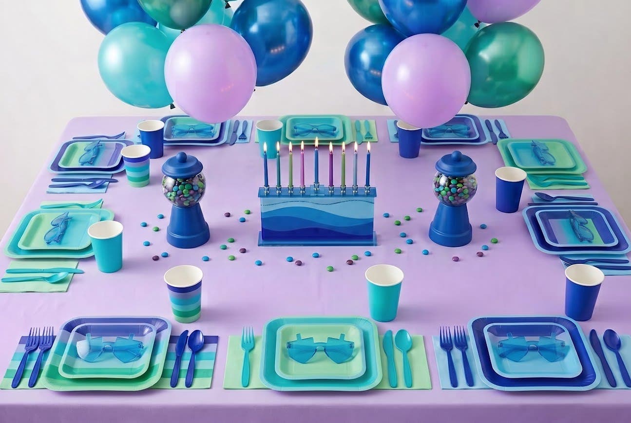 A kids' Chanukah (Hanukkah) party table idea in blue, teal and lilac