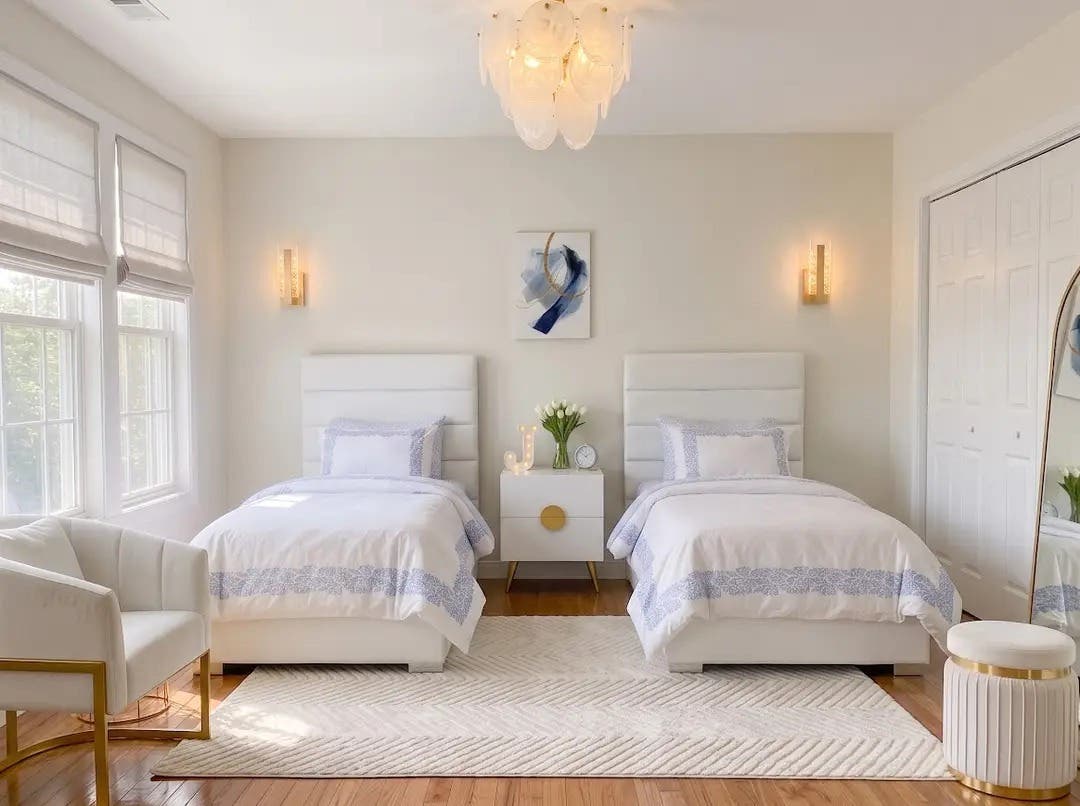 An elegant white and gold bedroom idea with soft blue touches, every piece linked