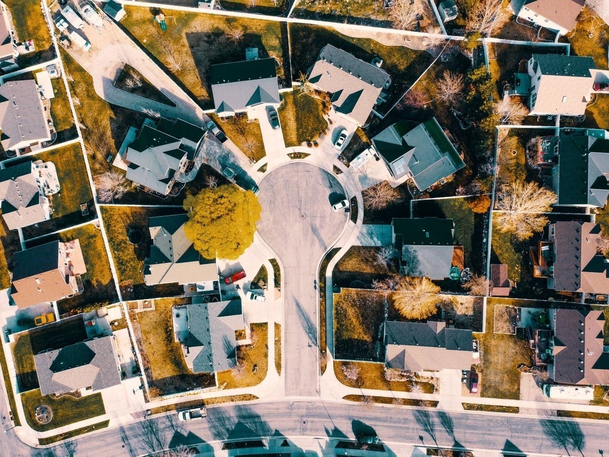 Two houses, one strip of concrete. In Ohio, the right to use a shared driveway usually comes from an easement rather than from ownership, and the two are not the same thing.