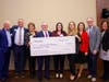 West Bend presents a $10,000 grant to the American Heart Association, supported by The Starr Group.