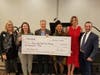 West Bend presents a $10,000 grant to Inner City Youth for Change, supported by Nulty Insurance Agency.