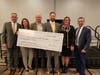 West Bend presents a $10,000 grant to Love in Action, supported by Bridgeview Insurance Agency.