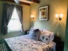 All three guest rooms at Scott House Ptown feature comfy queen-sized beds, private en-suite baths, AC, televisions, ceiling fans and plenty of storage. 
