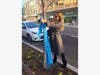 Rachael Katkocin, CSI DMC director of marketing and creative services, tying scarves to trees in DC
