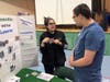 Katherine Hegarty from Melmark New England works on an activity with Matt Margherita from POST Academy. 