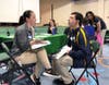 Helena Whitlow from Melmark New England conducts an interview with Brendan Fournier from TOP to determine his interests.