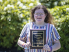Gabrielle Capone accepts the Outstanding Youth Leadership Award - High School