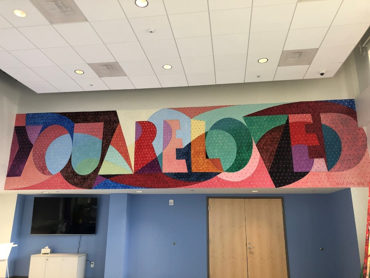 Stone House Unveils New "You Are Loved" Mural