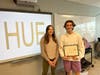 Whitney McNeilly, Program Coordinator for DanversCARES, presents the 2022 DHS Community Leader award to Danvers High School Junior, Grant Burden.