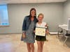 Rebecca Wait, mathematics teacher and DanversCARES Youth Leadership Coordinator at Holten-Richmond Middle School, presents the 2022 HRMS Community Leader award to 6th grade student, Paige Sherman.