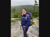 Aimee Deaton at a training hike on Jennings Peak as she prepares for the 27th annual Wilderness Heals pledge hike in the White Mountains of New Hampshire to benefit the Stone House  taking place this weekend.