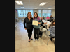 Katie Bahret is presented with a DanversCARES Youth Leader of the Year  award by Kaarin Robinson, who serves as the DanversCARES high school youth advisor.