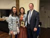 Krista Normandin (center) receives the Trusted Adult of the Year award from A Healthy Lynnfield's Director, Diana DeLeo, and the organization's chair, Phil Crawford.