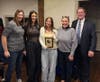 Emma Giardina receives the Middle School Youth Advocate Award from A Healthy Lynnfield's Youth Council advisors and the organization's chair, Phil Crawford. Pictured (l-r): Marisa Botta, Myla Zinetti, Giardina, Jessica Tortola, and Crawford.