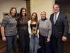 Molly Geary receives the Unsung Hero Award from A Healthy Lynnfield's Youth Council advisors and the organization's chair, Phil Crawford. Pictured (l-r): Marisa Botta, Myla Zinetti, Geary, Jessica Tortola, and Crawford.