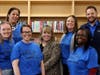 Volunteering to help students learn the skills of financial stewardship are LAFCU employees, from left, Britney Weber, Robyn Howell, Kellie Swiger, Christine Wood, Alyssa Troub, Shelia Scott and Zac Williams.