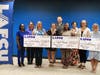 LAFCU team members pose with three of the four winners of the credit union’s 2023 Pathway to Financial Transformation Essay Contest. Cyrene Irelan, Caliyah Roberson and Elizabeth Ronning were each awarded $2,500 for their one-page essays. 