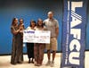 2023 LAFCU Pathway to Financial Transformation Essay Contest winner, Caliyah Roberson, poses with her family, (L-R), Tequia Adams (mom), Jireh Roberson (son), Rachel Freeman (grandma), Josh Roberson (husband) after she received her $2,500 check. 