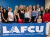 LAFCU staff pose with 2023 Teachers Grant program recipients after a check presentation at LAFCU headquarters. Each winner was awarded $500 after they were selected based on their applications & explanations of how the funds would benefit their students.
