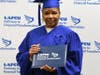 Cheryl Mask poses with her diploma after completing LAFCU’s eight-month Pathway to Financial Transformation program for the second time, reflecting her continued commitment to financial growth and stability.