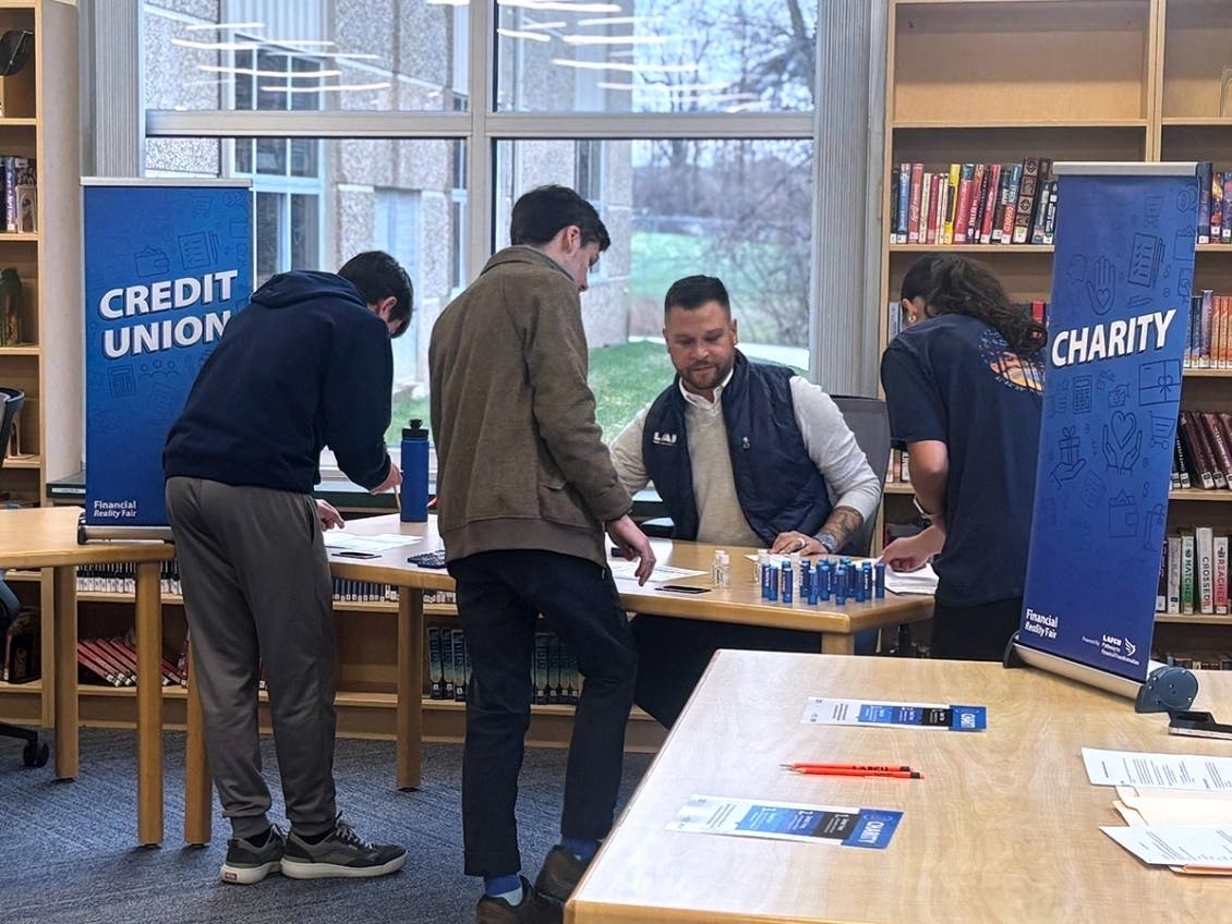 High school students review their spending choices and monthly budgets during a LAFCU Financial Reality Fair, an interactive simulation designed to teach real-world financial decision-making, budgeting and money management skills.