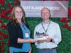 Kristen Terpstra, business development manager and Steven Struck, CPA, principal in the tax department at Maner Costerisan’s Grand Rapids office, celebrate the firm’s recognition as a 2026 Best Place to Work in West Michigan.
