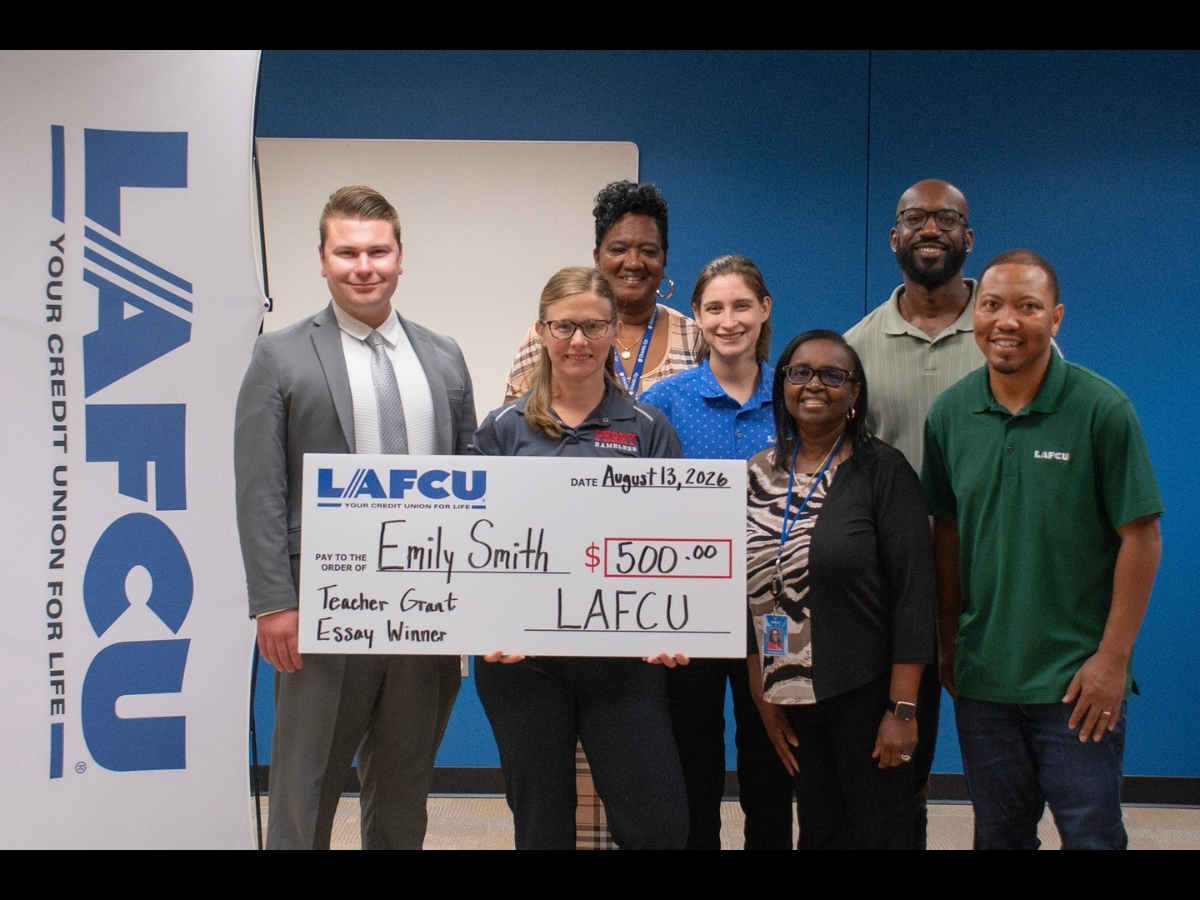 LAFCU team members pose with 2026 Teachers Grant recipient Emily Smith. Smith, along with Matt Grandstaff, Nicole Nesbitt, Jennifer Newberry, and Bilyana Zambova received one of five $500 grants from LAFCU to support classroom learning and student needs.