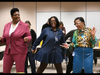 LAFCU team members take a moment to dance together during the Pathway to Financial Transformation graduation ceremony, highlighting the sense of connection and camaraderie that are part of the credit union’s workplace culture.