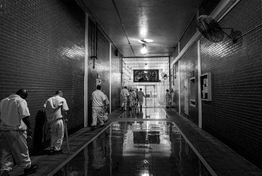 Inmates In a Prison Hallway