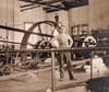 Branford Electric Power Plant--Boilers produce steam to drive turbines which move belt to drive generator 