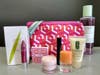Clinique gift bag with perfume and makeup products is an item in the online auction