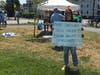 Protest sign at the Wake Up The Earth event at Collins Cove.