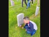 Nicholas Wilson admires the headstones of the fallen heroes (Tahoma National Cemetery)