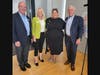 Pictured from left to right:  Chris Palazzi and Liz DeCoursey of Morris Habitat, Tashi Vazquez of Perth Amboy's office of economic and community development, and Paul Boudreau. 