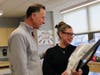 District 123 Superintendent Dr. Paul Enderle presented Nicole Petschenko with flowers to recognize her achievement.
