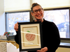 Nicole Petschenko was surprised with a word art cloud from her colleagues to celebrate her Award of Excellence recognition.