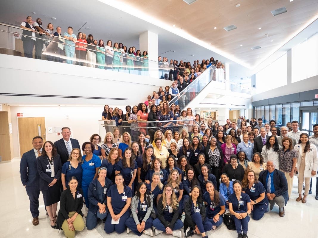 Staff celebrating opening day at the Melchiorre Cancer Center. Located on the Cooperman Barnabas Medical Center campus, the facility will serve as the northern destination for oncology services for RWJBarnabas Health and Rutgers Cancer Institute