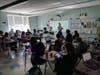 A classroom full of teachers taking part in one of the over 100 sessions and activities.