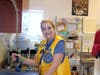 Our fearless leader, Lion Liz Sandeman in the kitchen