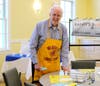 Lion Gerry Irwin helping with clean up