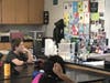 Medfield veteran Jeff Cook talks with sixth grade students about his time serving in the military on Thursday, Nov. 7. 