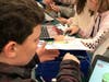BMS students work on a challenge at the Makey Makey Station at the Hour of Code event.